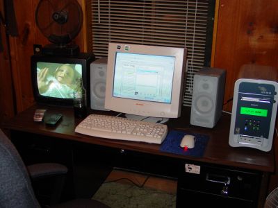 The computer setup in my room. 1.7 GHz P4/512 RAM/80 GB HD/4x DVD-R.