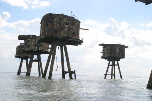 Weird buildings on stilts in the sea